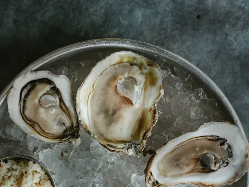 Swiss Deluxe Hotels Stories Summer 2021 Oysters Baby 01 Andrew Cebulka Stocksy 1825003 Ecirgb