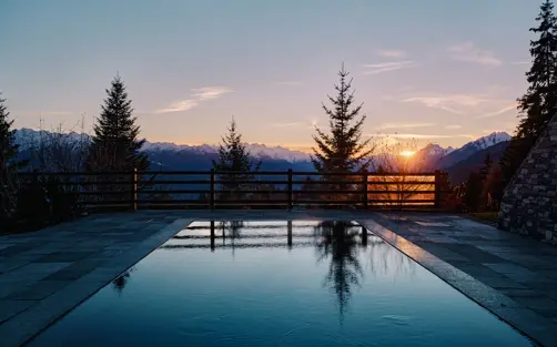 Lecrans Hotel Spa Crans Montana Sunset Pool View Summer