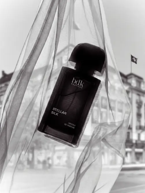 Swiss Deluxe Hotels H Magazine Summer 2026 BU A Silk Silhouette Shot In Front Of The Mandarin Oriental Zurich, Captures The New Unisex Fragrance By BDK Parfums. Opener