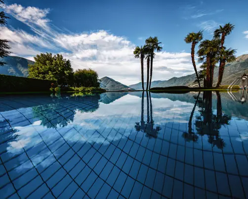 Swiss Deluxe Hotels Stories Summer 2022 Paradise Found 04 Aussenpool Morgens 3 Ecirgb