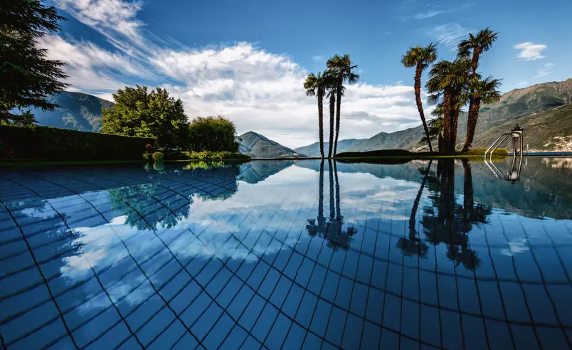 Swiss Deluxe Hotels Stories Summer 2022 Paradise Found 04 Aussenpool Morgens 3 Ecirgb