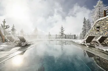 Lecrans Hotel Spa Crans Montana Heated Outdoor Pool Winter