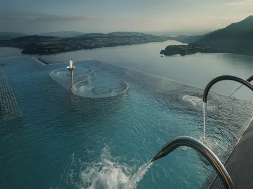 Swiss Deluxe Hotels Magazine Winter 2024 25 Alpine Spa Exterior Infinity Edge Pool
