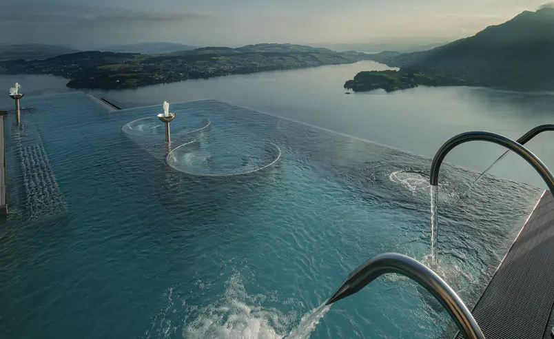 Swiss Deluxe Hotels Magazine Winter 2024 25 Alpine Spa Exterior Infinity Edge Pool