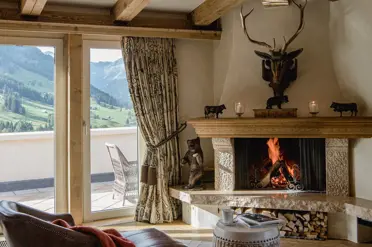 Gstaad Palace Hotel Penthouse Suite Fireplace