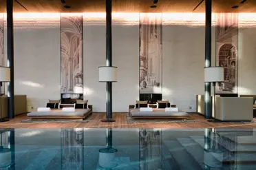 The Chedi Andermatt Hotel CAM Pool Indoor Pool Lounges 01